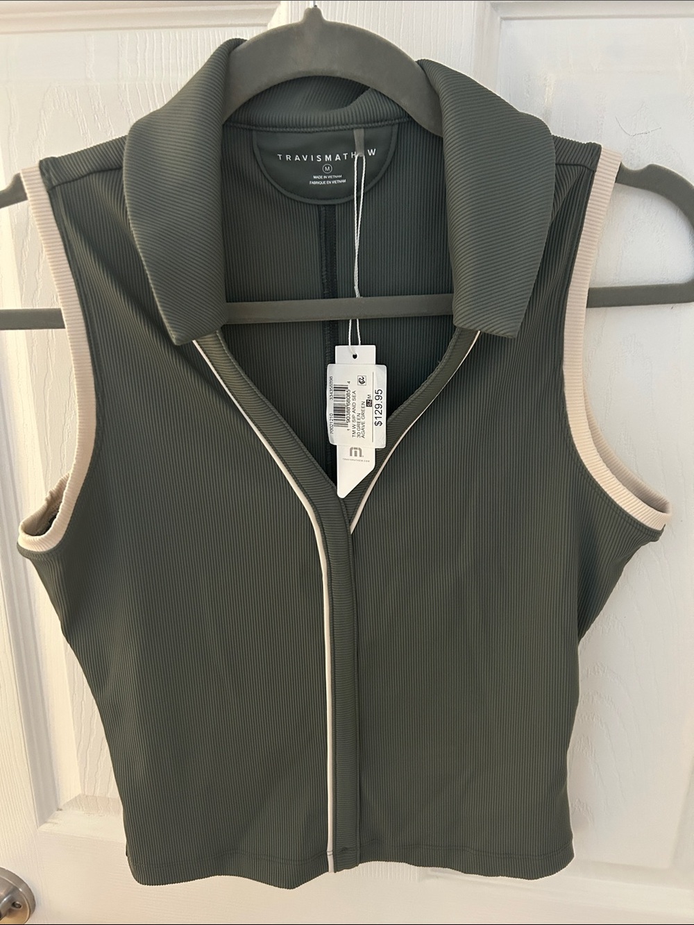 Travis Mathew Green Sleeveless Polo with Cream Piping